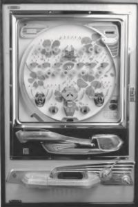 Vintage1974 Sankyo Mini-Mouth pachinko machine. Source: Pachinkoplanet. com at https://tinyurl.com/yxeo43v9.