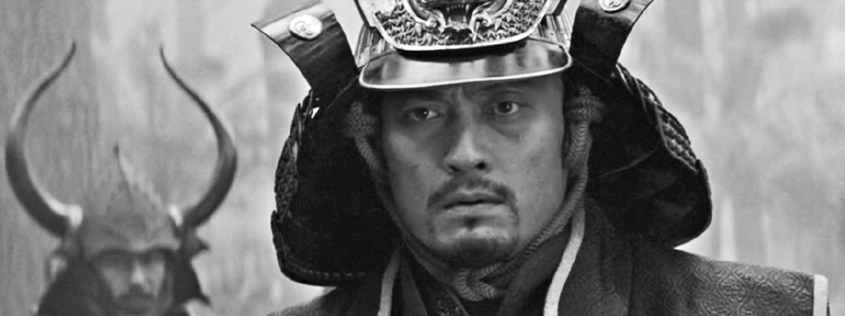 photo of a man wearing a samurai helmet