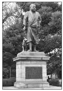 statue of a man and a dog