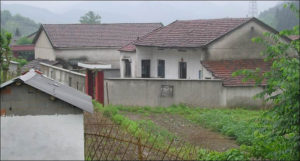 photo of a gate leading to a courtyard house