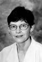 photo portrait of a woman with short hair and glasses