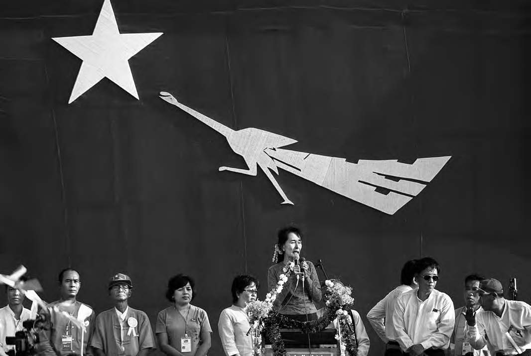 Aung San Suu Kyi gives a speech to supporters during the 2012 by-election campaign at her constituency Kawhmu Township, Myanmar on March 22, 2012.