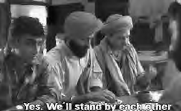 three young men sit next to each other. the screen caption reads "yes. we'll stand by each other."