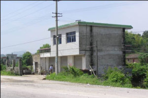 an abandoned two story home