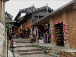 a view of a more traditional building, with stone steps leading past the building