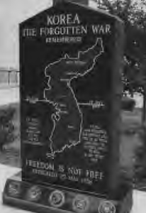 a photo of a stone monument saying: "Korea: the forgotten war"