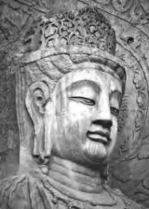 carved head of a buddha statue head