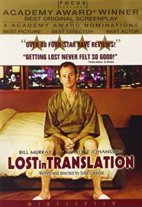 movie cover for lost in translation. Features a man in a bathrobe and slippers sitting despondently on a hotel bed.