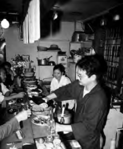 Photo of man pouring drinks for customers