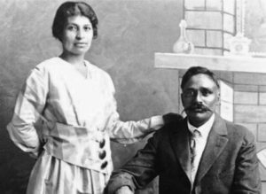 a man and woman pose for a photo 