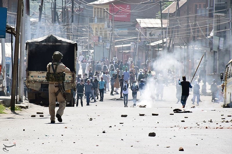 Police in Kashmir confronting violent protesters in December 2018.