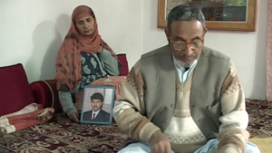 The parents of Fayaz Ahmad, who disappeared on September 9, 1997.