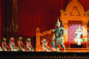 various actors in elaborate costumes on the stage