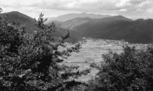 Photo of  valley and surrounding mountains