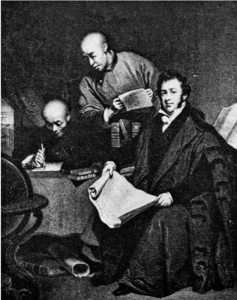 A Western man with a piece of paper in his hand sits with two Chinese men, one is writing and the other is standing behind them.