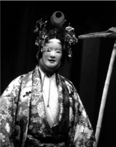 Image of a woman wearing Noh clothes and with Crown of Heaven on her head