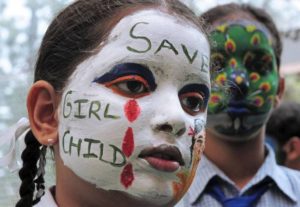 Photo of a girl face with slogan Save Girl Child