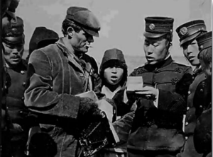 A Japanese soldier is checking the papers of a Western man