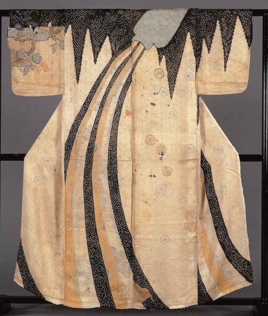 Artist unknown, “Kosode with Overturned Flask Design.” Mid to late 17th century, Edo period (1603–1868), kanoko shibori tie-dyeing and ink on white figured satin.