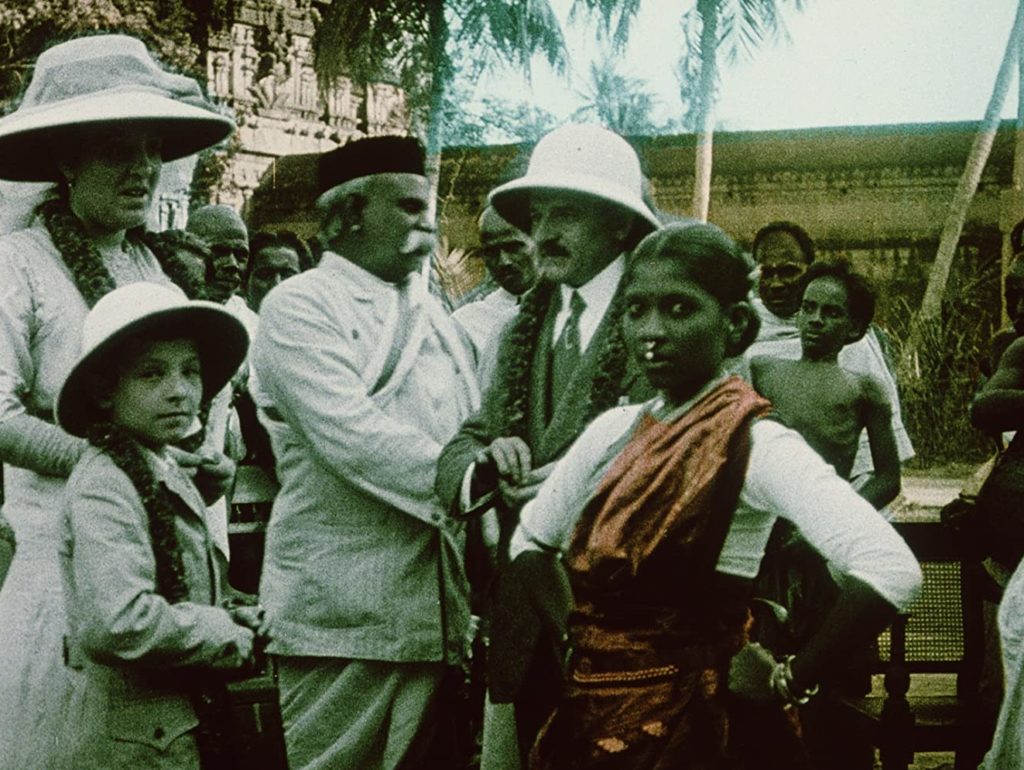 photo of a british family attending a hindu ceremony, with women in sari