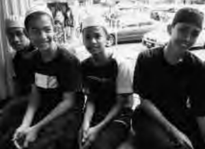 Photo of four Malay boys 