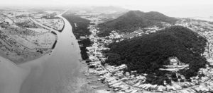 Aerial view of Hà Tiên City and flooded rice fields on the Gulf of Thailand coast of the Mekong Delta, southern Việt Nam.