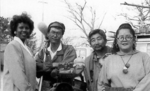 Image of four smiling people