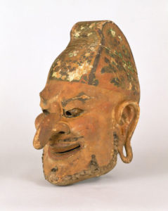 A gigaku mask of the “Intoxicated Barbarian King” used in an ancient form of drama performance originating in Korea.