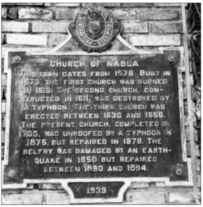 Image of church plaque noting its frequent history of natural hazards.