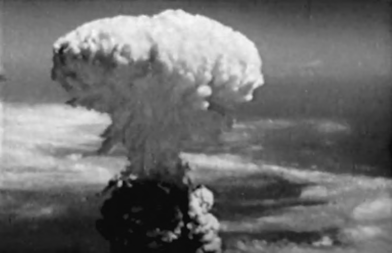 Mushroom cloud over nuclear bombing of Nagasaki.