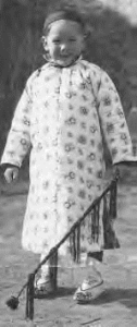 photo of a young child in elaborate dress