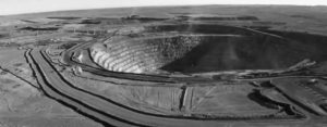 A large hollowed out coal mine settled in the steppes of Mongolia. Oyu Tolgoi is a copper–gold mine in the south Gobi region of Mongolia. It holds one of the largest undeveloped high-grade copper deposits in the world.