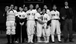 Screen capture shows the YMCA team poses for a photo