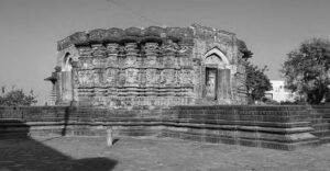 photo of a temple made from stone. it looks like the temple is made of ridges, like that would be made from water erosion