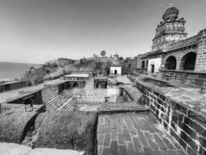 a photo of the temple, showing the courtyard and raised steps