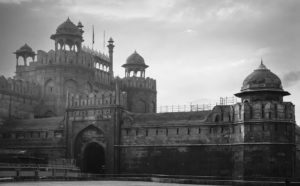 a photograph of a large castle with a large, imposing gate