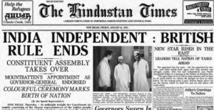 a photograph of a newspaper, the headline reading india independent: british rule ends