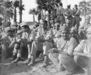 black and white photograph of several men in uniform