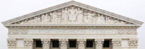 Image of the front of the supreme court building, showing the details of the architecture.