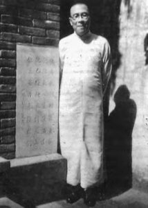 photo of a middle aged man in robes
