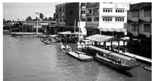 Some water taxis docked at the shore