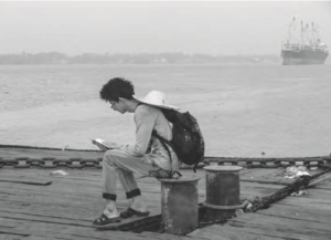 A student waits for a ferry to cross the Yangon River at the start of an overnight trip to an isolated village. Photo by program student.