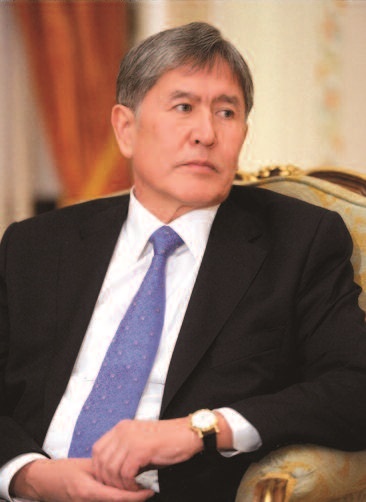 President Almazbek Atambayev. He is a middle aged man with grey hair and is wearing a business suit. 