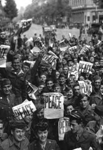 many people hold signs that say "peace"