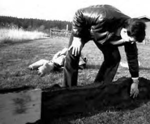 a man touches a part of the wall