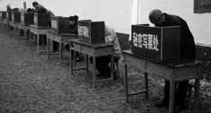 photo of people voting at polling booths