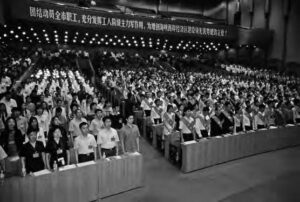 photo of a large group of people standing in rows