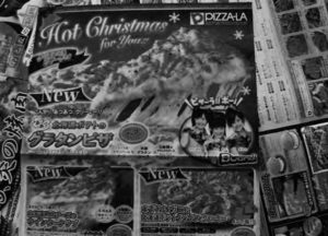 photo of a pizza box that says "hot christmas"