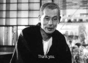 a man speaking, with the screen caption "Thank you."