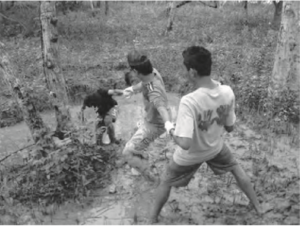 A group of students walk down a mountain together.